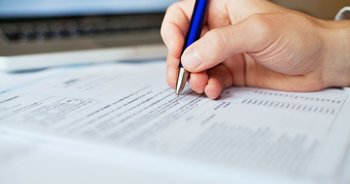 A person doing paperwork.