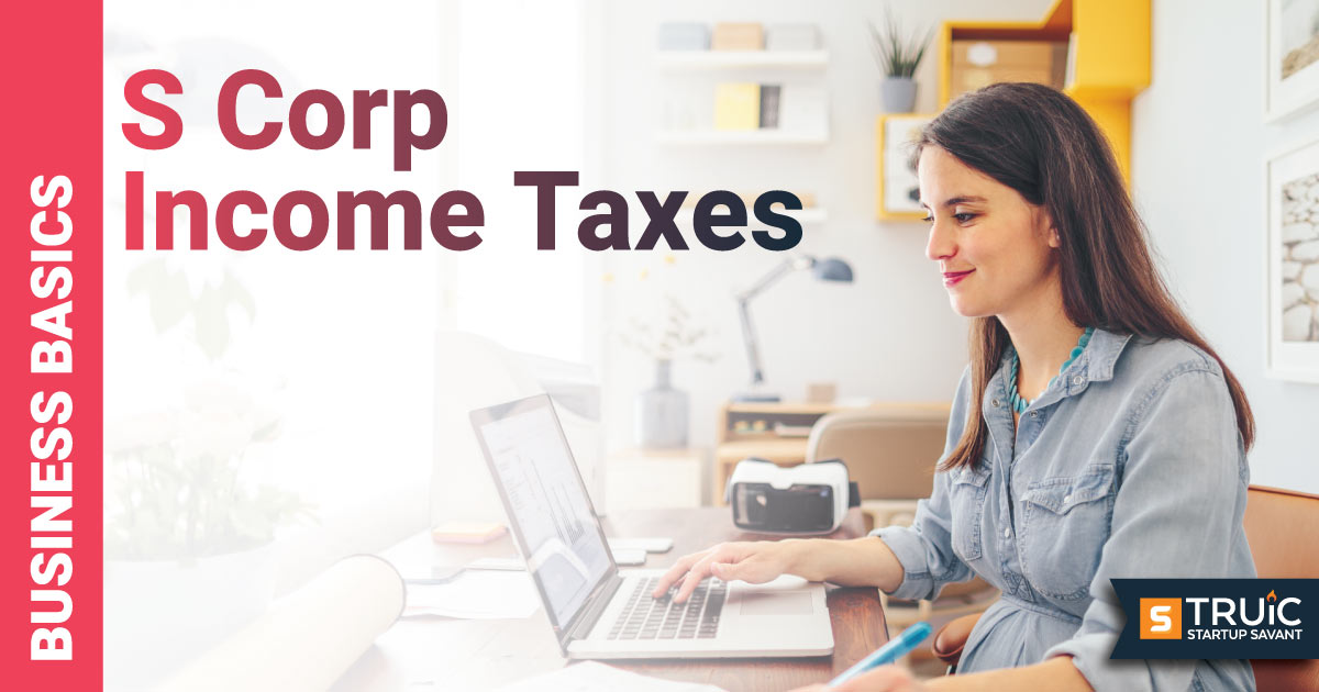 Woman doing paperwork at a desk.