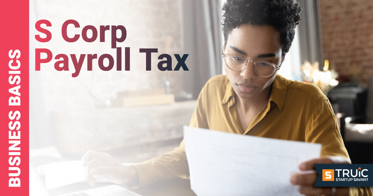 Woman doing paperwork at a desk.
