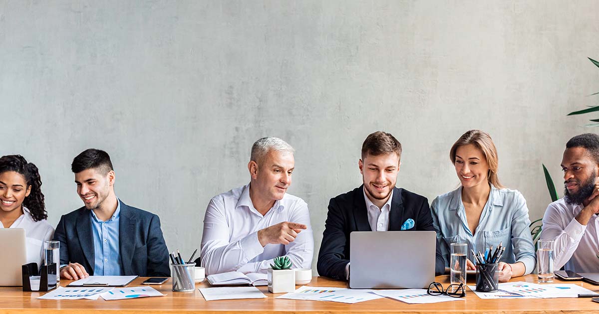 A group of business people collaborating in a meeting.