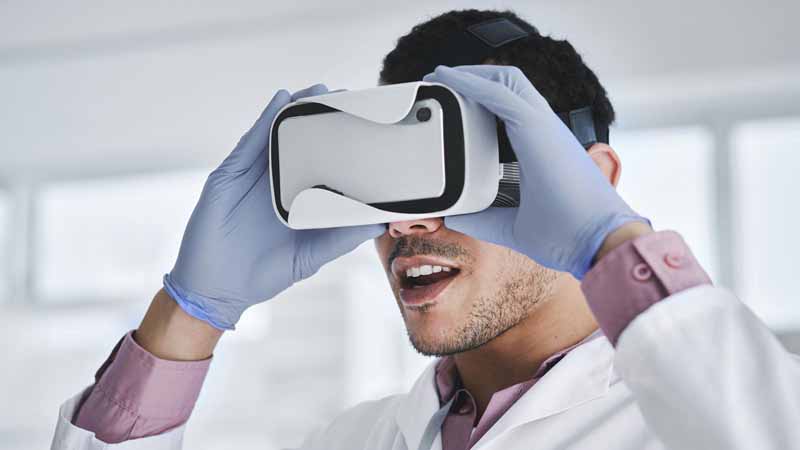 A scientist using a VR headset.