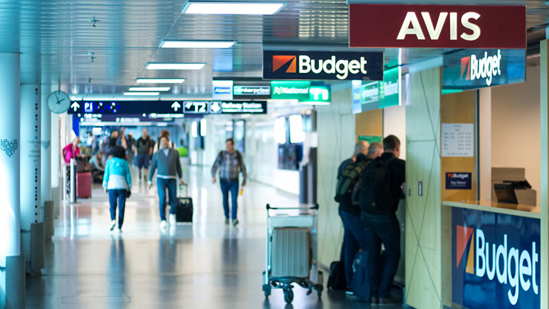 Row of car rental agencies at Helsinki airport.