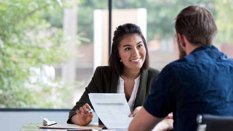 A businesswoman meeting with a client.