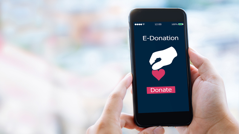 Phone showing an E-Donation screen.