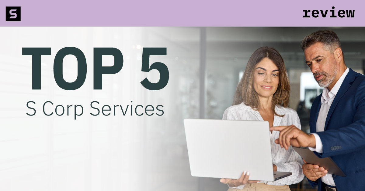 Coworkers working together at a conference table.