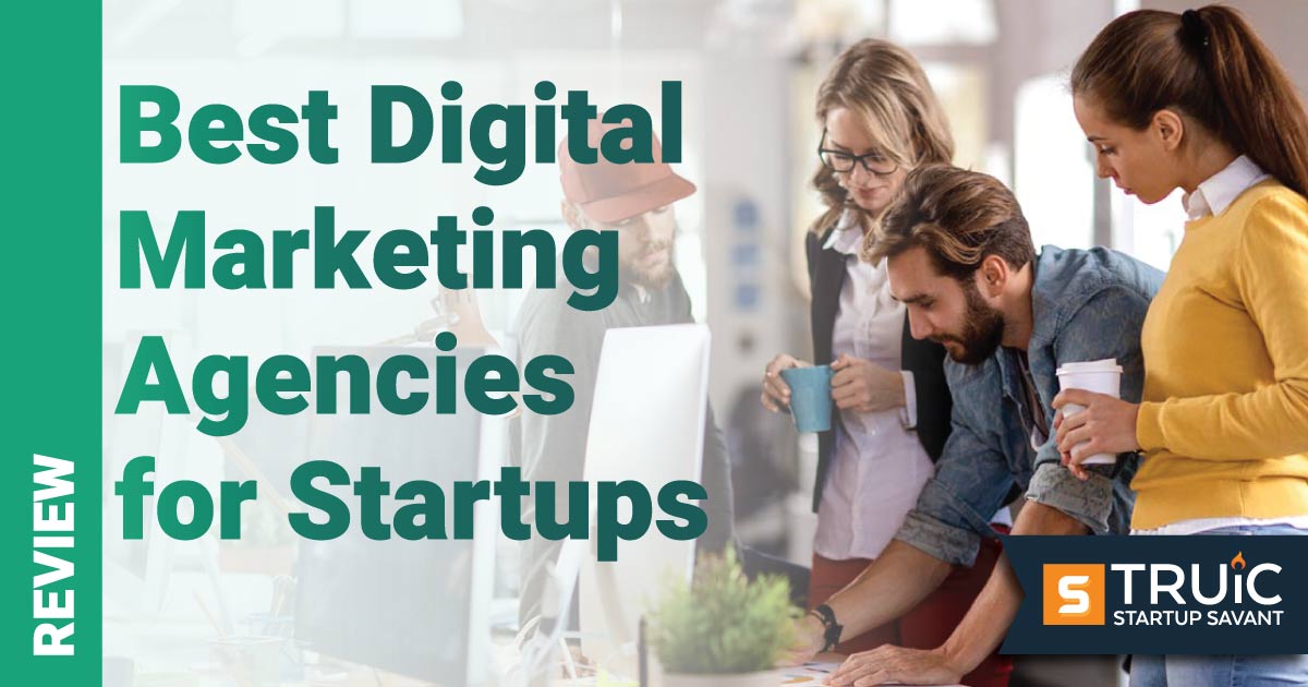 Four co-workers collaborating in an office.