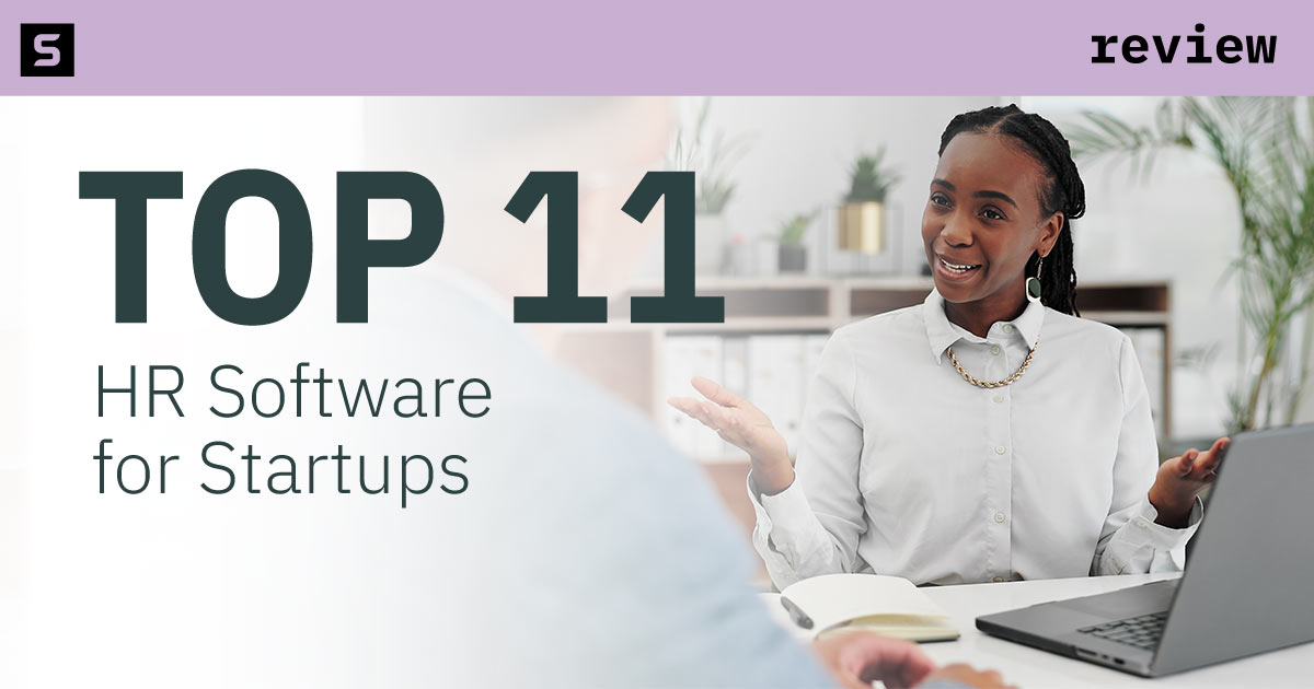 Two women on computer looking at hr software.