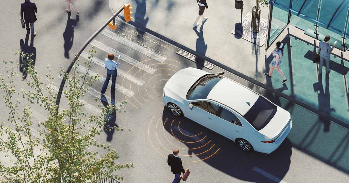 Driverless car stopping for pedestrians.