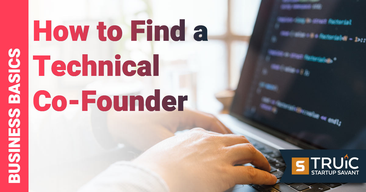 Someone at a computer writing code.