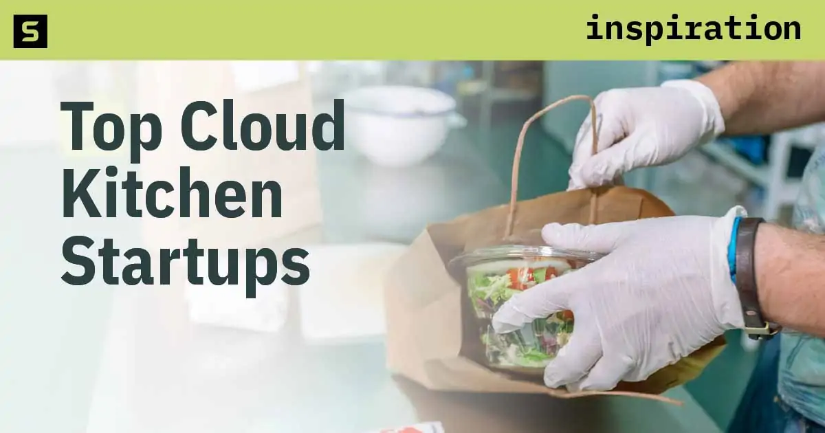 Blurry photo of chefs in a professional kitchen.