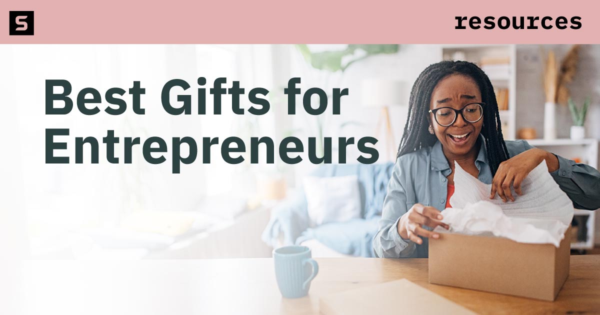 Woman opening a gift.