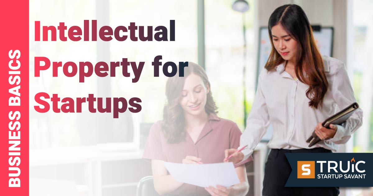 Two people in an office discussing intellectual property.