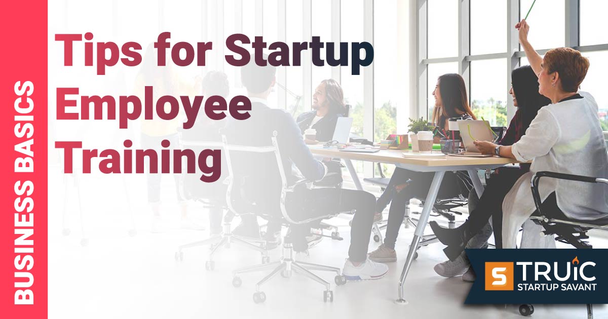 People at a table in a meeting.