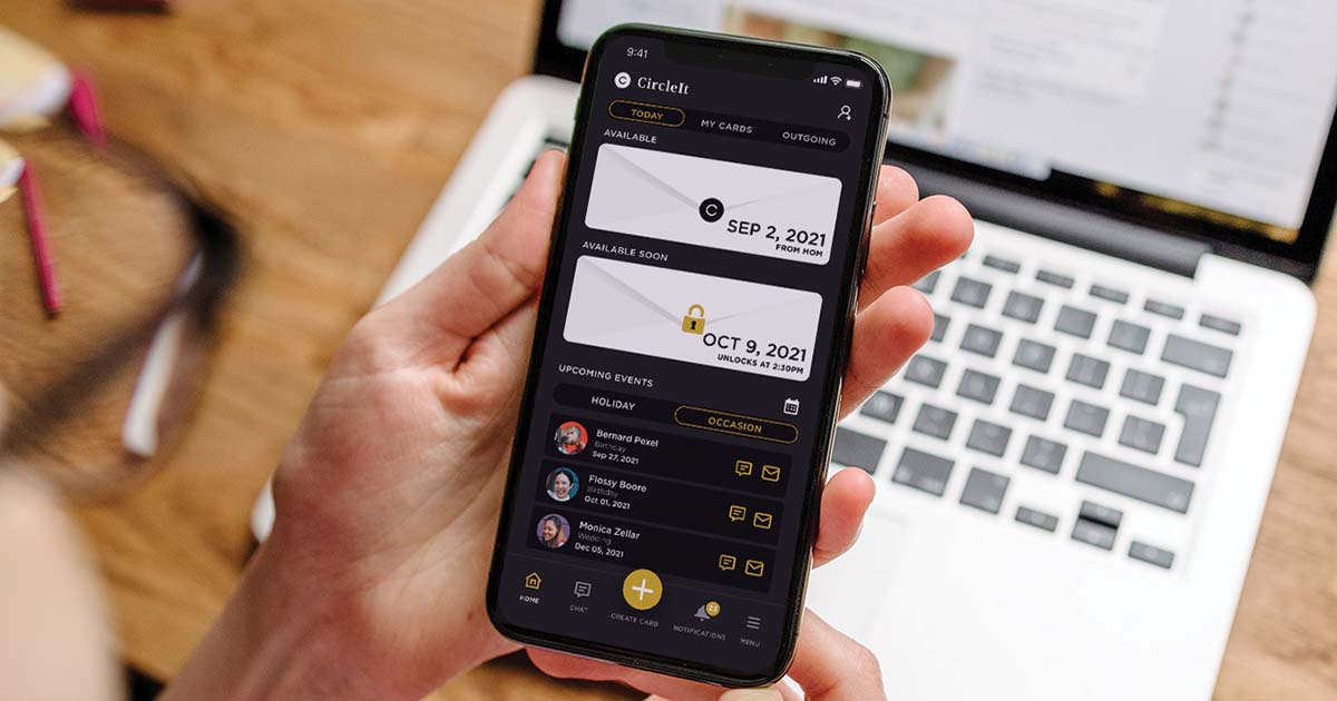 Hand holding iPhone with CircleIt app opened.
