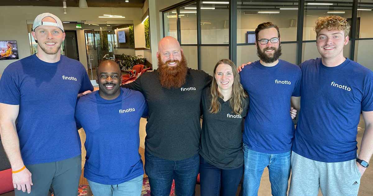 Finotta team posing together.