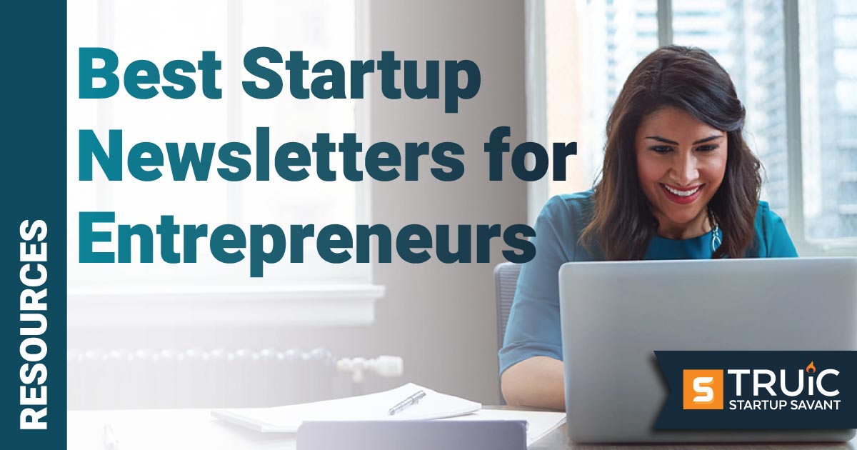 Smiling businesswoman at computer.