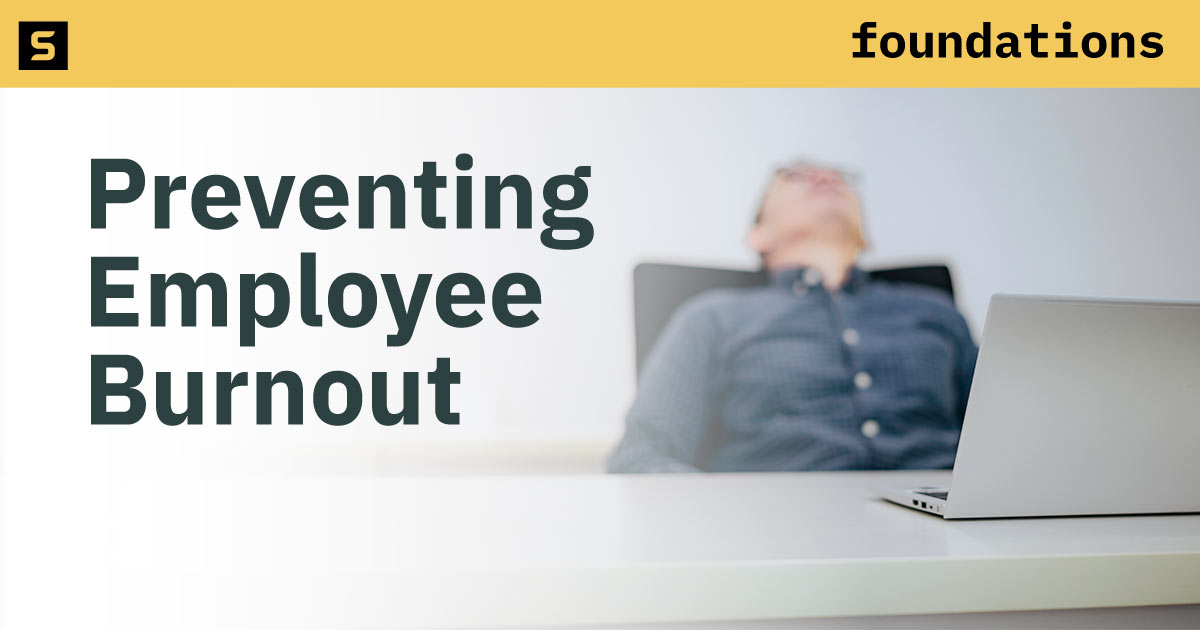 Stressed out woman in office.