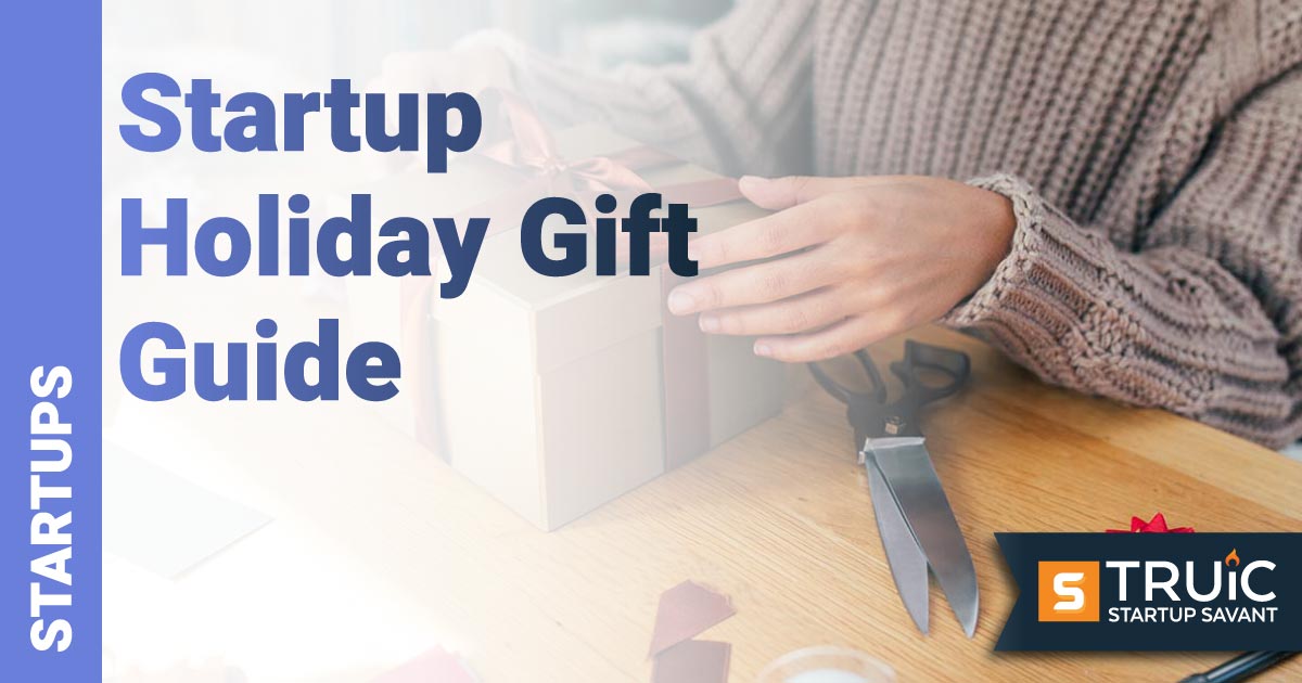 Young woman wrapping a present at home.