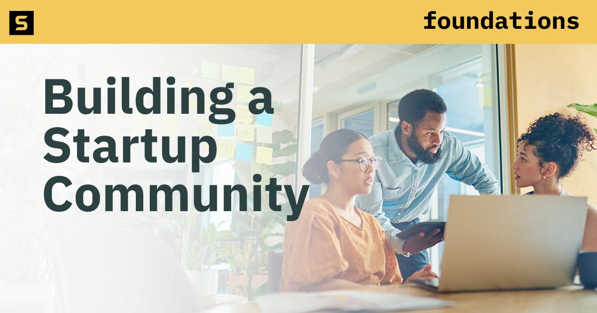 Diverse group of businesswomen smiling.