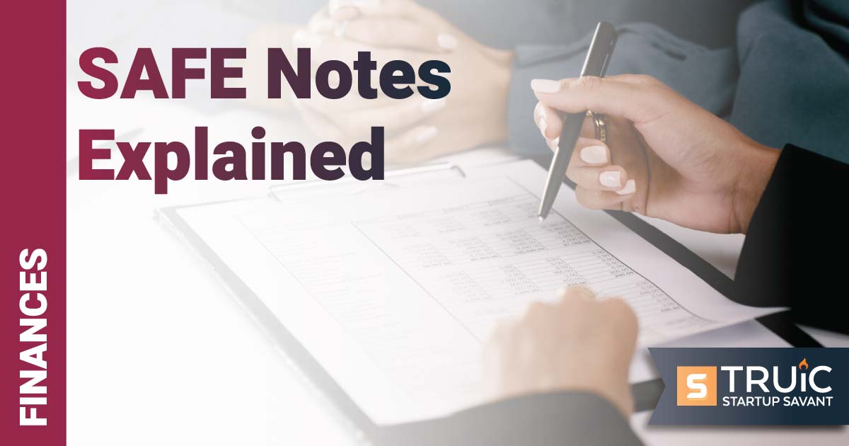 Two people doing paperwork.