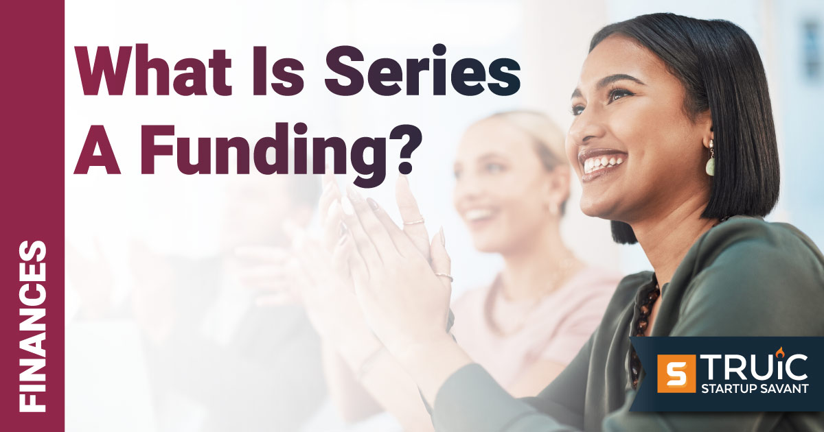 Group of people smiling and clapping.