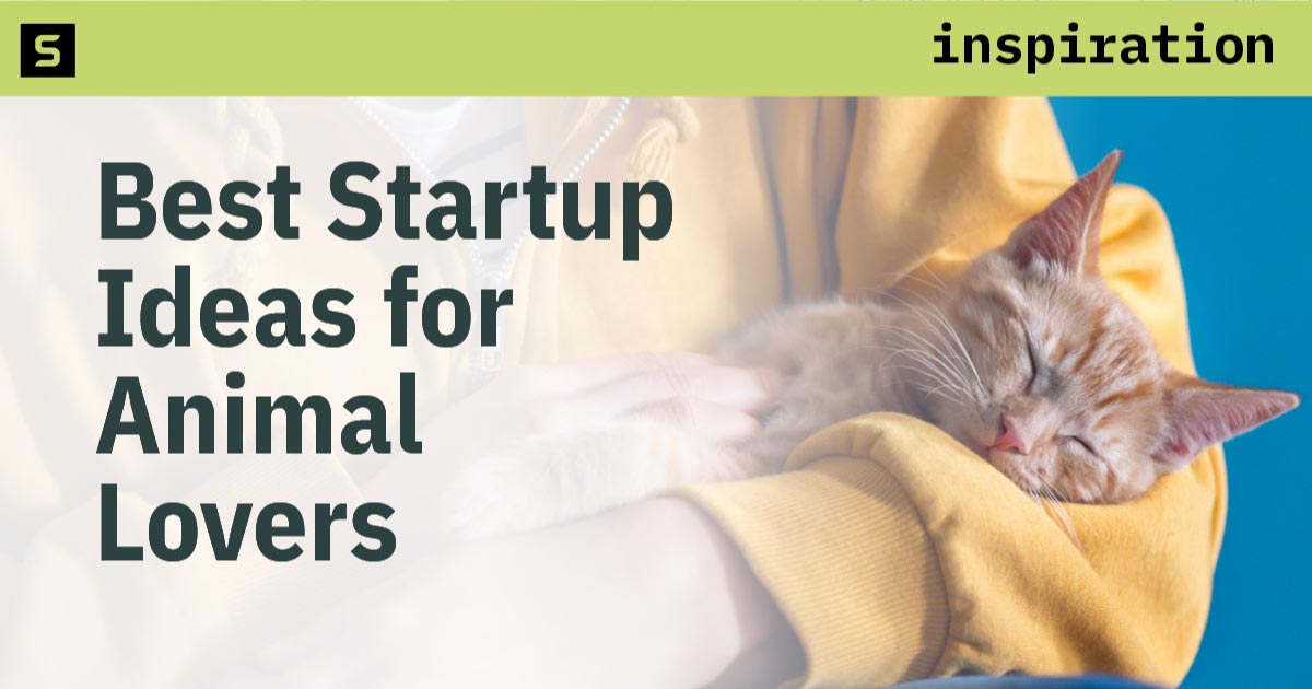 Woman holding a small dog.