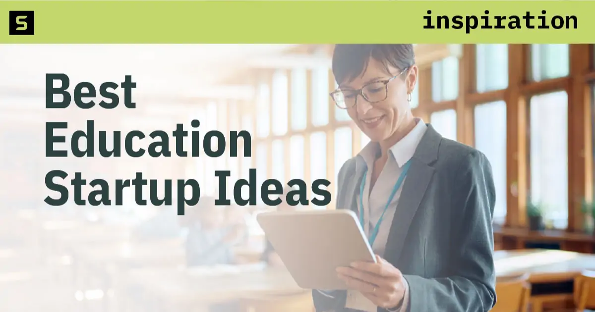 Wood letters spelling learn and glowing light bulb.